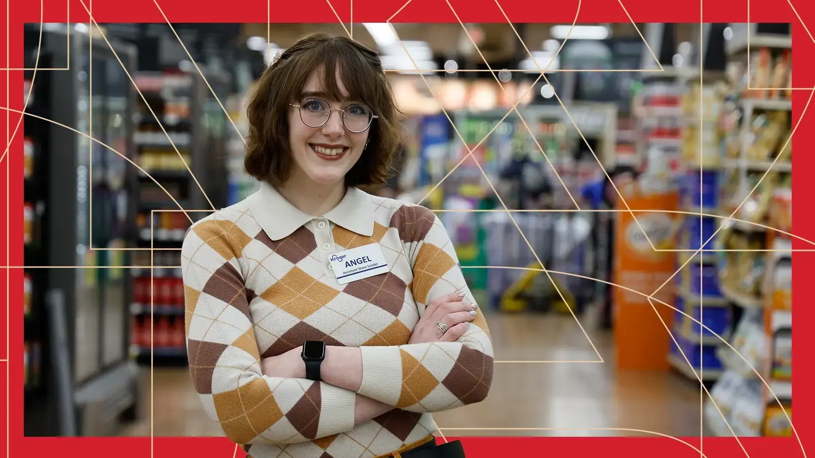 Kroger Assistant Store Leader Angel Berridge proudly poses in front of her grocery store. The photo has a red border and thin, gold, and geometric lines running through the background.